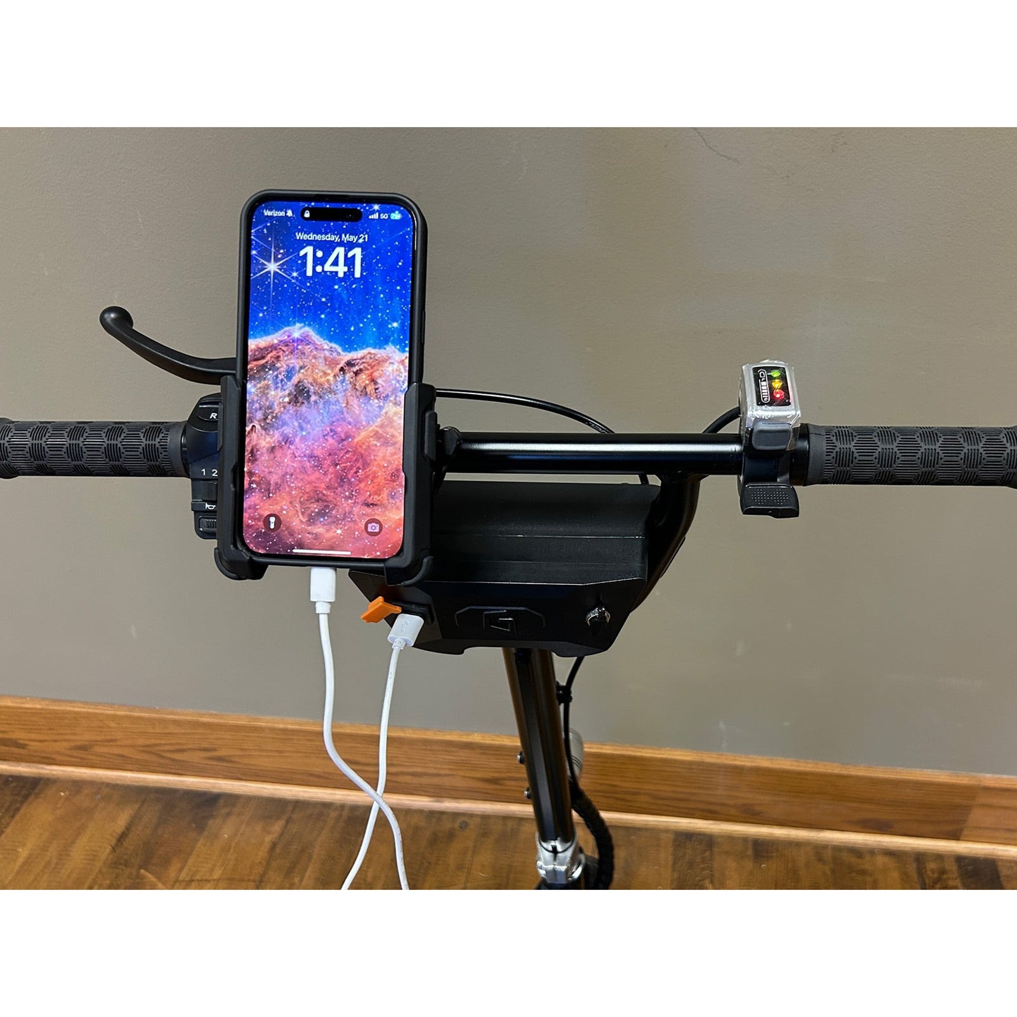 Optional USB charging port powering a smartphone